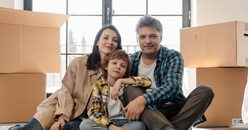 Human family stares across digital interface symbolizing the future of AI and human collaboration