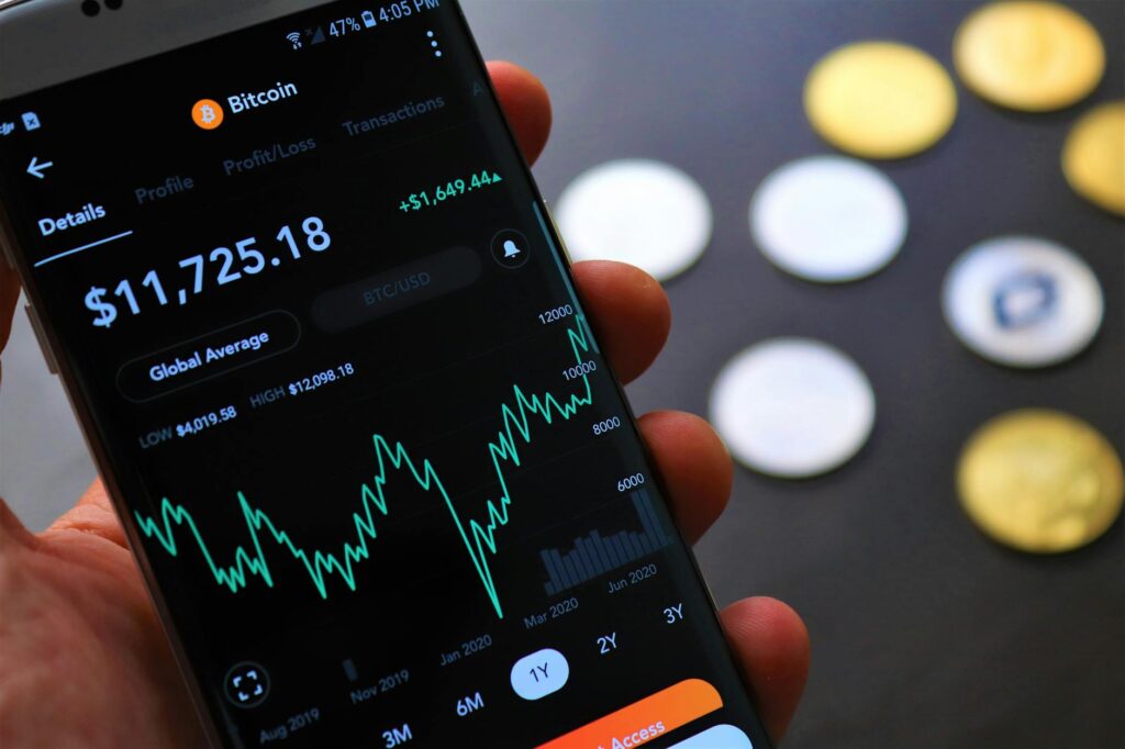 stock market graph on a cellphone in close up photography
