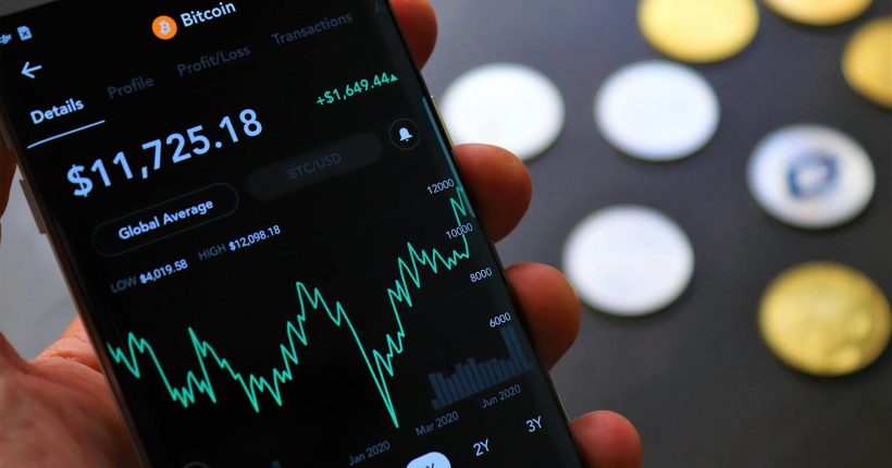 stock market graph on a cellphone in close up photography