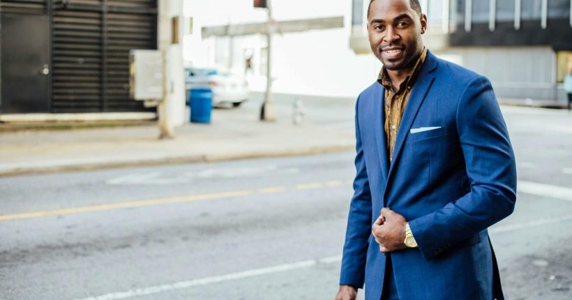 man wearing blue blazer