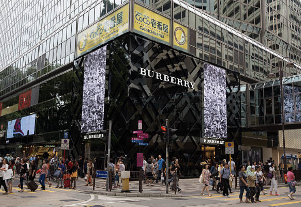 Burberry store showcasing iconic trench coats and scarves