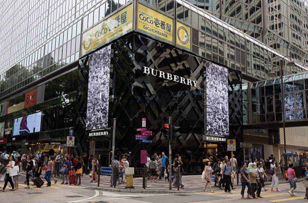Burberry store showcasing iconic trench coats and scarves