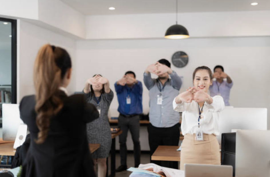 Financial professionals practicing mindfulness in a corporate setting.