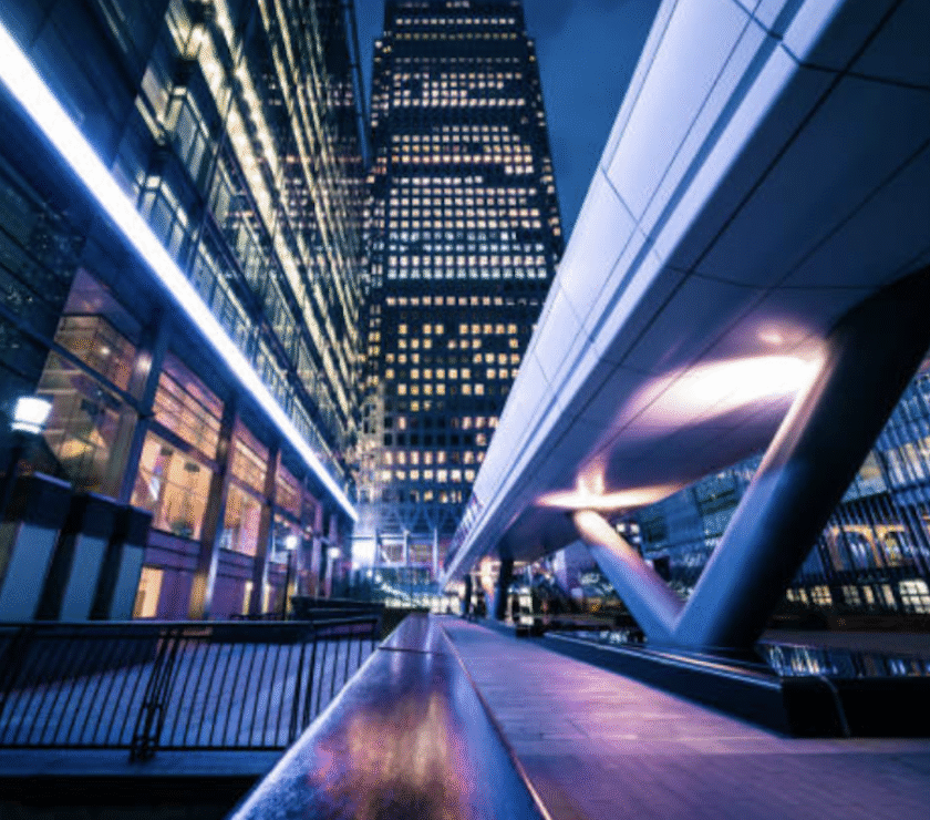 City night lights during downward movements, symbolizing market retreat amidst tariff concerns.