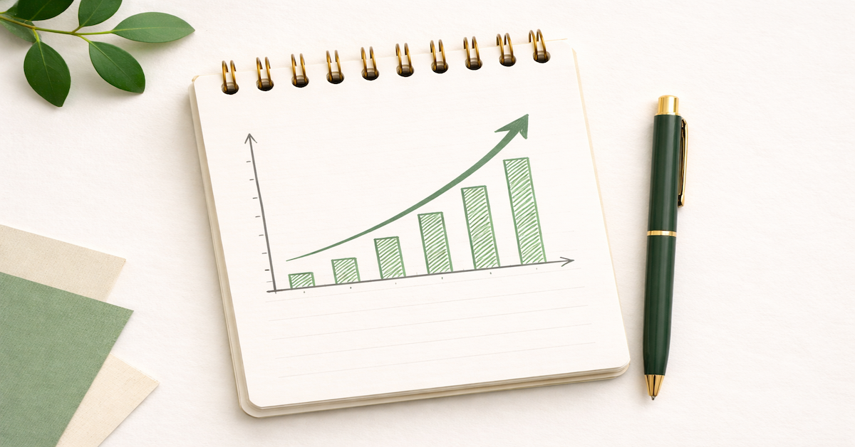 A hand-drawn upward line graph on a notepad representing early career income growth — salary increases, investment contributions starting, and financial momentum building in the first years of full-time work.
