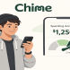Young Millennial smiling at their smartphone while using Chime's spending account and Credit Builder feature, representing accessible no-fee banking and credit building for everyday users