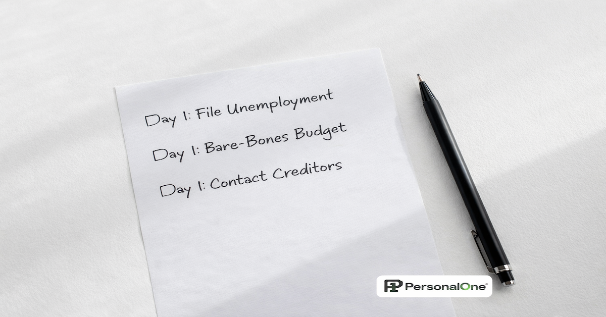 Handwritten day-one financial checklist for job loss with items for unemployment filing, bare-bones budget, and creditor contact on white desk — PersonalOne