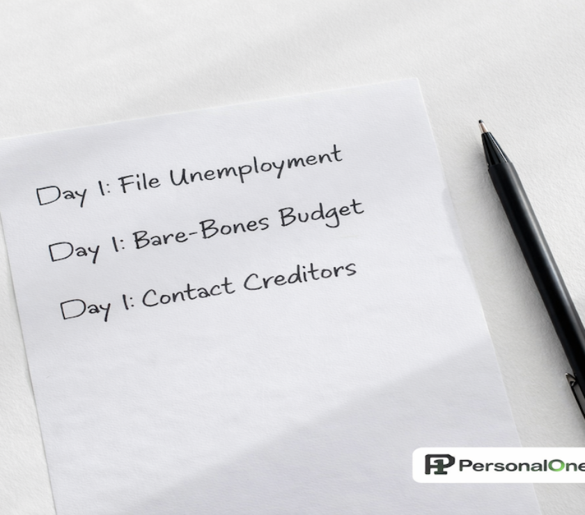 Handwritten day-one financial checklist for job loss with items for unemployment filing, bare-bones budget, and creditor contact on white desk — PersonalOne