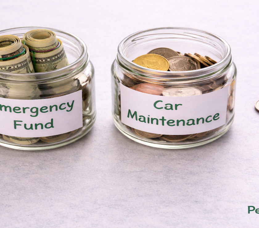 Two labeled glass jars side by side on a light gray surface — one reading Emergency Fund and one reading Car Maintenance with scattered coins nearby
