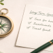 An open compass beside a handwritten planning sheet on a clean surface, representing the long-term financial strategy decisions of the wealth expansion stage — retirement planning, tax efficiency, and mapping the path to financial independence